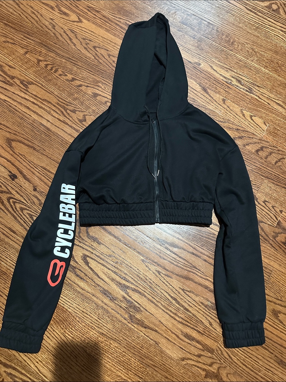 CycleBar Black Cropped Hoodie with Red and White Sleeve Logo